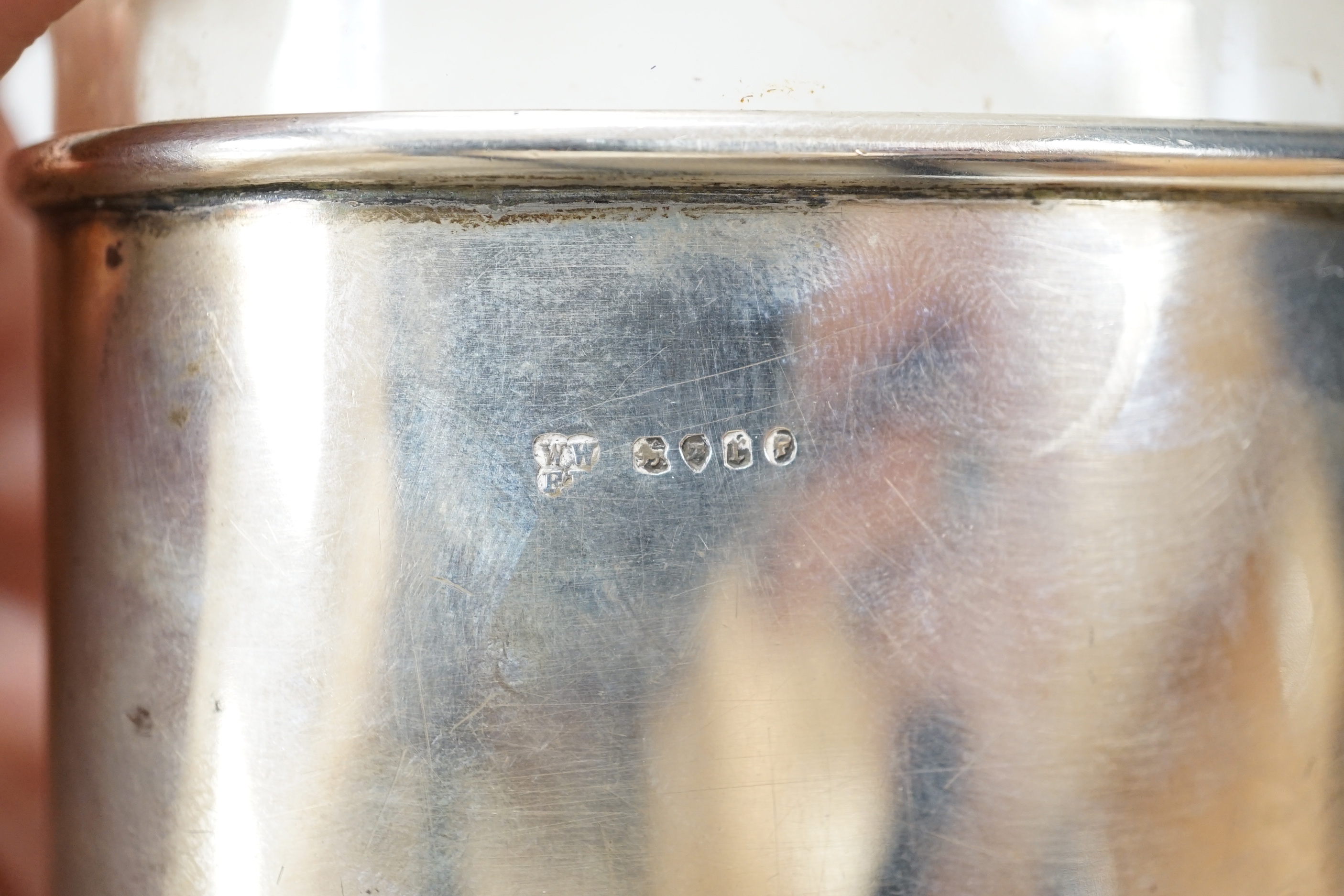 A Victorian silver mounted glass pocket flask, with crested cup base, London 1872, retailed by Asprey & Co., height 17.5cm